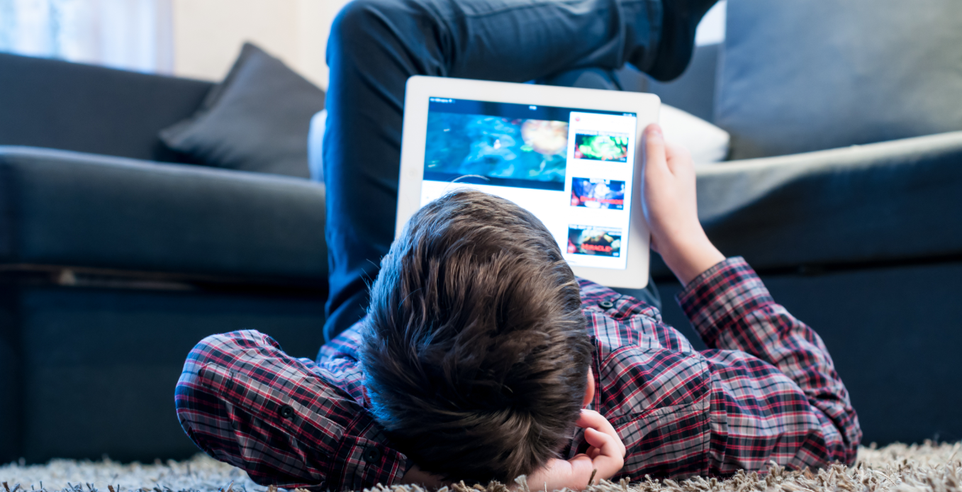 child watching ipad screen